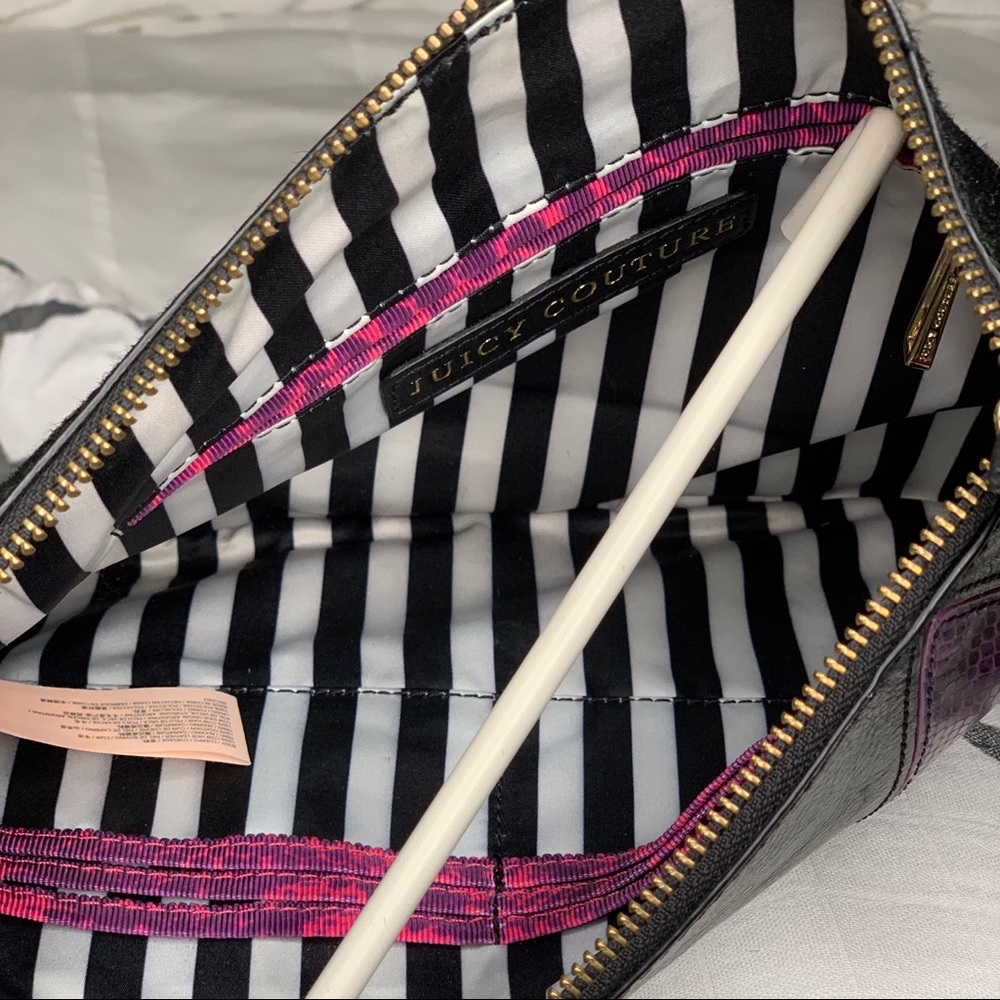 EUC- excellent used condition Juicy wristlet